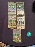 Front view of all five sealed 1992 O-Pee-Chee Premier Hockey card packs