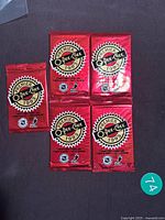 Front view of five sealed 1993 O-Pee-Chee Premier hockey card packs