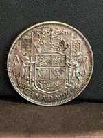 Reverse showing Canadian coat of arms and date 1946