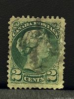 Front view of 2¢ green Queen Victoria Small Queen stamp showing design, perforations, cancellation