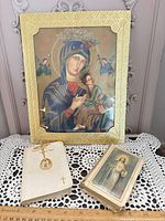 Overall lot showing framed icon, prayer books and crucifix