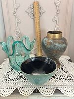 Group shot showing all three vessels with ruler for scale