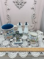 Group shot of all five items with ruler for scale