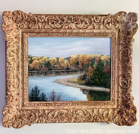 Full view of framed oil painting