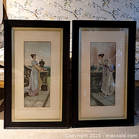 Both framed lithographs side by side