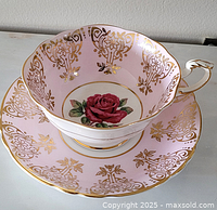 Teacup and saucer front view showing pattern and colours