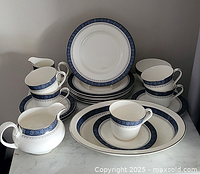 Group shot of entire Royal Doulton dessert set