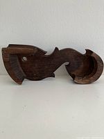 Top view showing fish shape and engravings