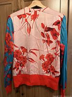 Back of jacket showing full floral print and color scheme