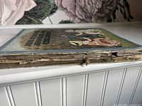 Spine and page edge damage on Mrs. Strang’s Annual for Children