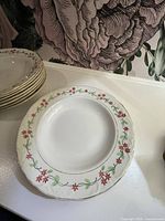 Stack and single example of floral pasta plates