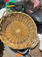 Top view showing interior weave pattern and handles