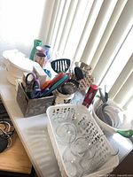 Full lot showing casseroles, vases, utensils, glassware and colander