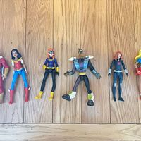 All six action figures lined up on floor