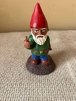 Front view of gnome showing colors and gesture