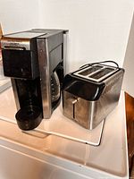 Coffee maker and toaster side by side