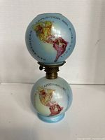 Full view assembled lamp showing graphics and text