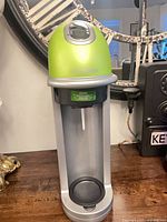 Full view of green and silver SodaStream Fizz carbonation machine