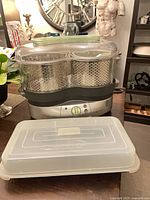 Front view of T-fal Vitacuisine steamer with additional plastic tray