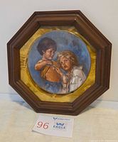 Front view of framed Gorham plate