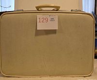Front view of vintage Boyle suitcase showing exterior color, handle, trim and latches