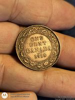 Reverse showing 1918 date and ONE CENT CANADA within maple-leaf wreath