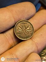 Reverse of 1937 Canadian 1 cent showing maple leaves and date