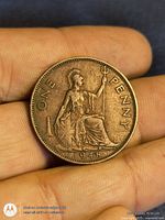 Reverse showing seated Britannia, denomination ONE PENNY, date 1948