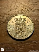 Reverse showing crowned Dutch coat of arms, denomination 2½ G, year 1980, word NEDERLAND