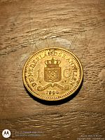 Reverse side with shield, legend, date