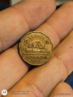 Reverse side of 1942 Canadian 5-cent coin with beaver design and date