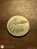 Reverse showing salmon design and 10P denomination