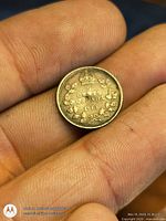 Reverse of 1919 Canadian 5 cent coin showing crown, denomination, date