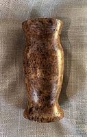 Front view showing full shape and burl pattern
