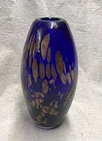 Front view of cobalt blue vase showing metallic flecks