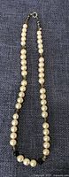 Full necklace laid flat showing bead arrangement