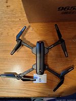 Top view of Ascend ASC-2680 drone showing all four propeller arms and body