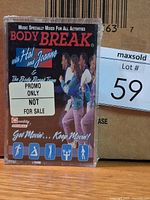 Front view of sealed Body Break cassette with promo sticker