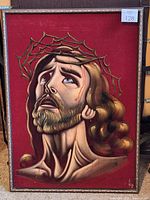 Front view of velvet painting in frame