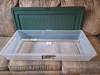 Overall view of storage box with lid and cellophane roll