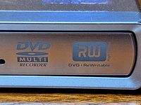 Front panel of optical drive showing DVD Multi Recorder and RW markings