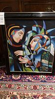 Full view of framed cubist painting showing two figures and frame