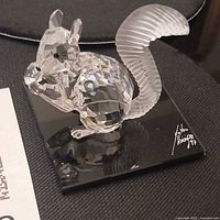 Crystal squirrel on mirrored base showing overall appearance and etched signature