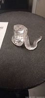 Front view of clear faceted crystal snake figurine