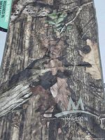 Camouflage cooling towel showing Mission logo