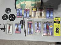 Overview of all packaged Freud bits, Ryobi countersink set, loose bits and accessories on table
