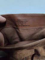 Size label showing US 9 EUR 40 UK 7 and made in China inside boot
