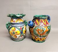 Front view of both majolica pieces showing form and colour