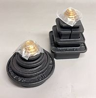 Two assembled stacking weight sets, one round, one square, showing overall condition