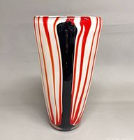 Front view of striped glass vase